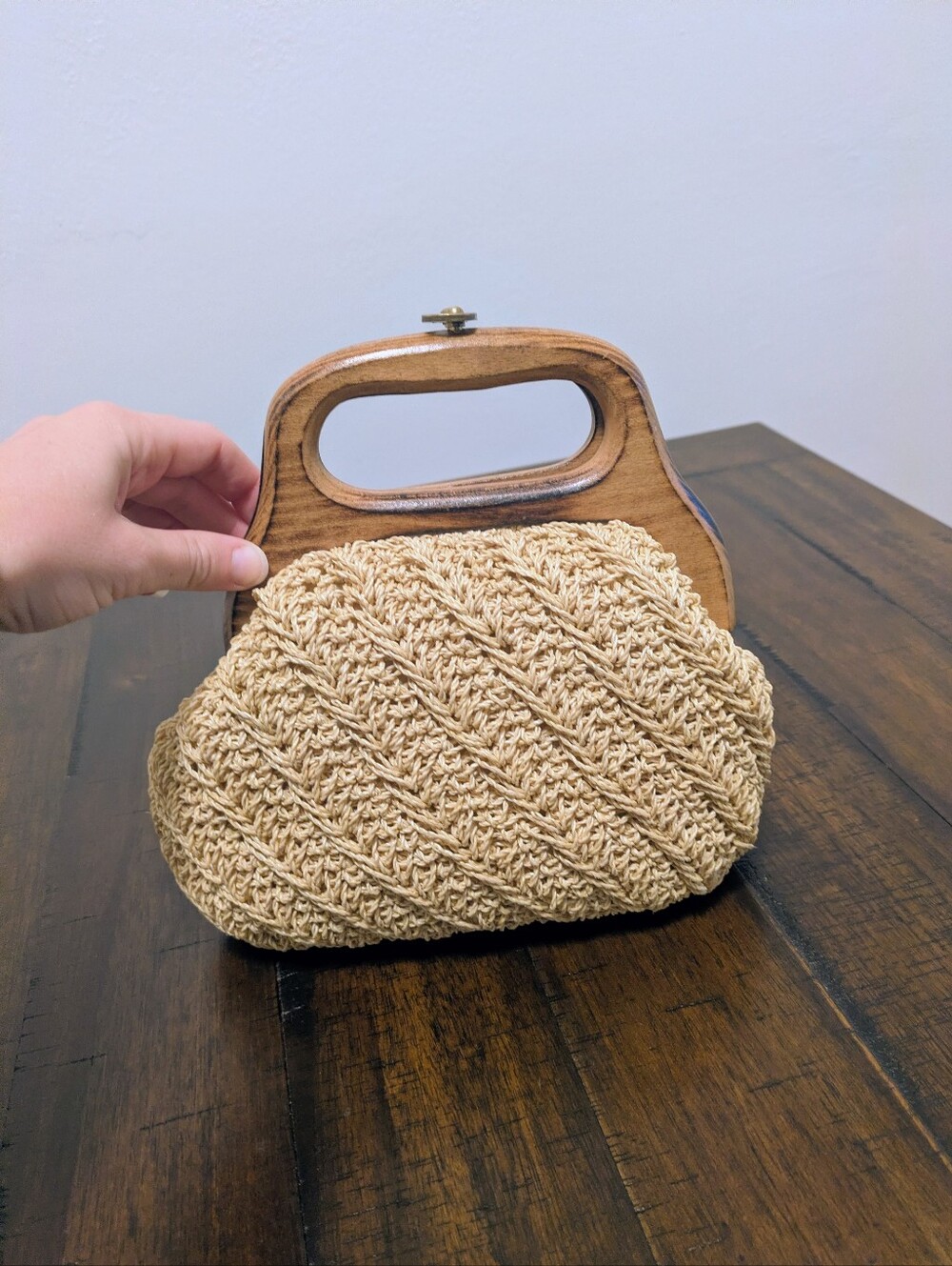 Vintage 1960s mid-century woven straw clutch bag with carved wood handle made in
